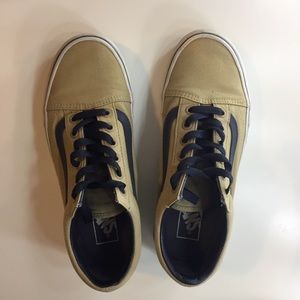 Tan and blue low top vans